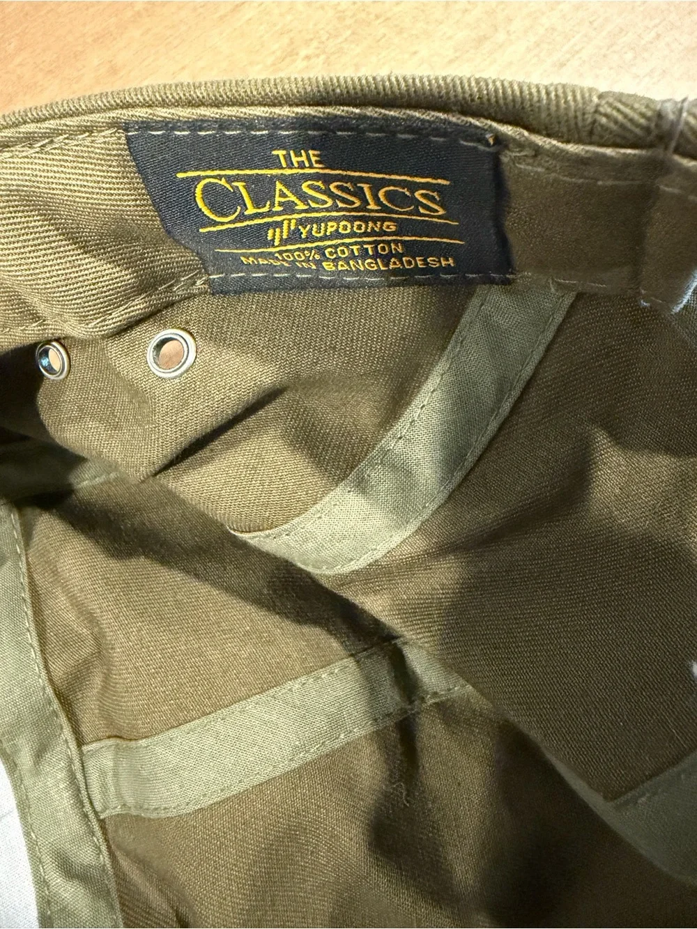 The Classic Olive Green Canvas Five-Panel Hat with Brown Patch